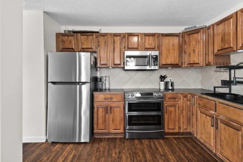 66 Elston Place Se, Airdrie, AB - Indoor Photo Showing Kitchen