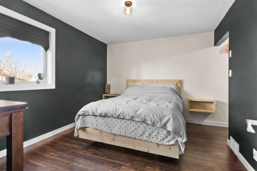 66 Elston Place Se, Airdrie, AB - Indoor Photo Showing Bedroom