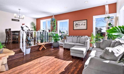 66 Elston Place Se, Airdrie, AB - Indoor Photo Showing Living Room