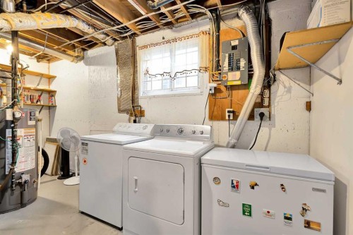 6584 Dalrymple Way Nw, Calgary, AB - Indoor Photo Showing Laundry Room
