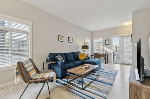 78 Sage Bluff Circle Nw, Calgary, AB - Indoor Photo Showing Living Room