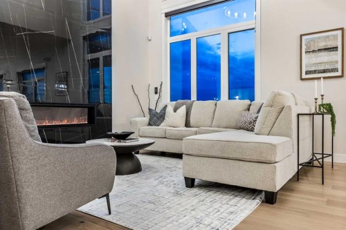 112 South Shore View, Chestermere, AB - Indoor Photo Showing Living Room With Fireplace