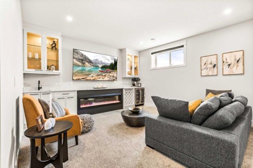 112 South Shore View, Chestermere, AB - Indoor Photo Showing Living Room With Fireplace