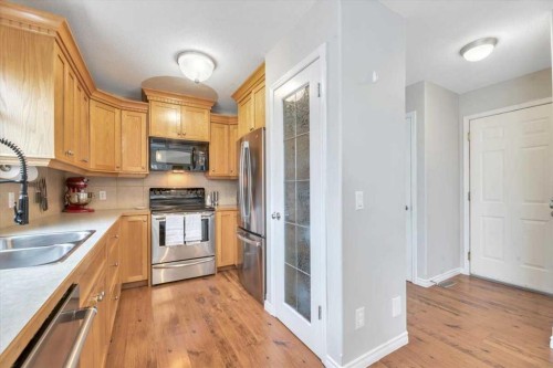 90 Parklane Drive, Strathmore, AB - Indoor Photo Showing Kitchen With Double Sink