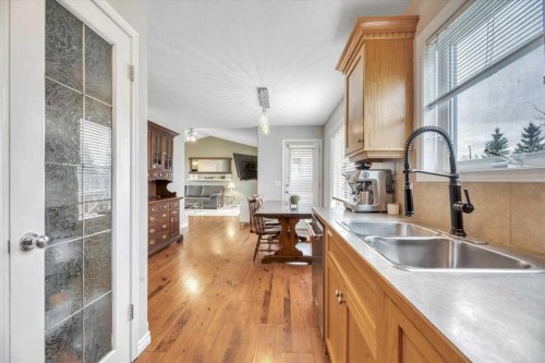 90 Parklane Drive, Strathmore, AB - Indoor Photo Showing Kitchen With Double Sink