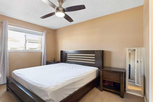 227 Bridlewood Circle Sw, Calgary, AB - Indoor Photo Showing Bedroom