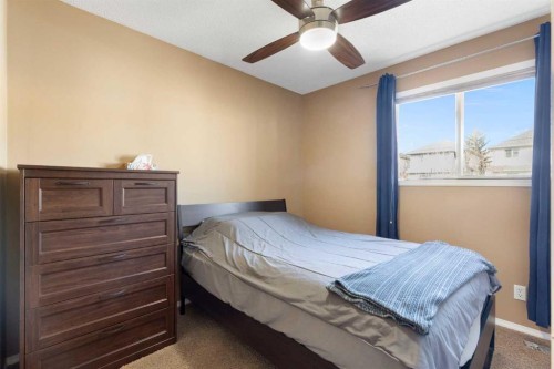 227 Bridlewood Circle Sw, Calgary, AB - Indoor Photo Showing Bedroom