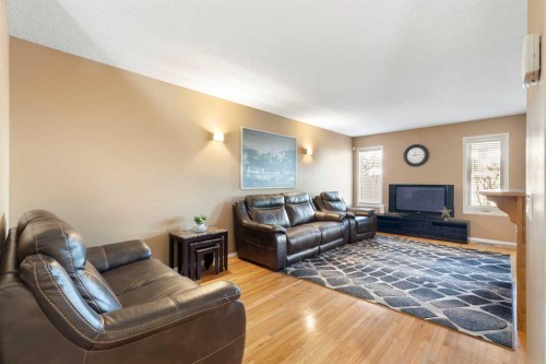 227 Bridlewood Circle Sw, Calgary, AB - Indoor Photo Showing Living Room