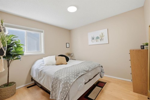 10205 Hidden Valley Drive Nw, Calgary, AB - Indoor Photo Showing Bedroom