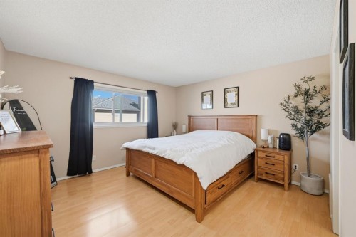 10205 Hidden Valley Drive Nw, Calgary, AB - Indoor Photo Showing Bedroom