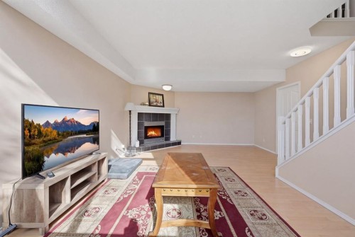 10205 Hidden Valley Drive Nw, Calgary, AB - Indoor With Fireplace