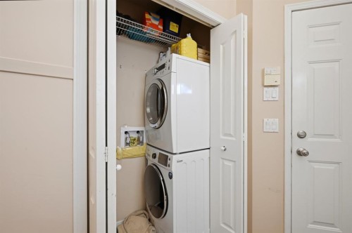 10205 Hidden Valley Drive Nw, Calgary, AB - Indoor Photo Showing Laundry Room