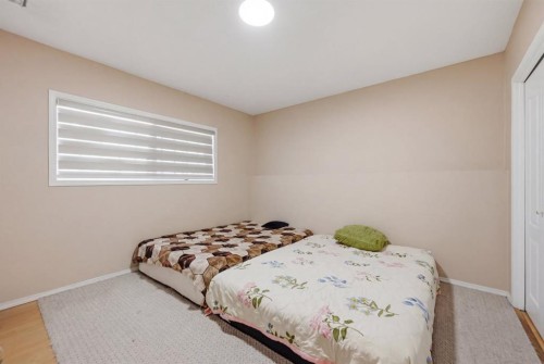 10205 Hidden Valley Drive Nw, Calgary, AB - Indoor Photo Showing Bedroom