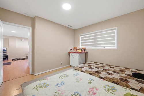 10205 Hidden Valley Drive Nw, Calgary, AB - Indoor Photo Showing Bedroom