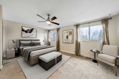 100 Woodfield Green Sw, Calgary, AB - Indoor Photo Showing Bedroom
