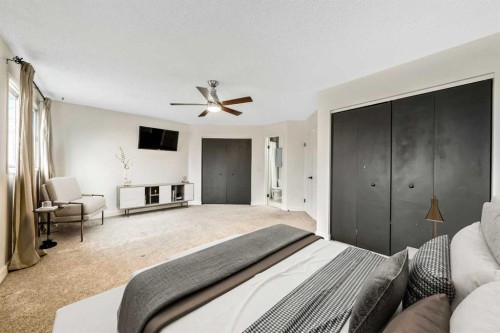 100 Woodfield Green Sw, Calgary, AB - Indoor Photo Showing Bedroom