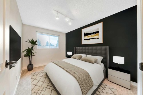 100 Woodfield Green Sw, Calgary, AB - Indoor Photo Showing Bedroom