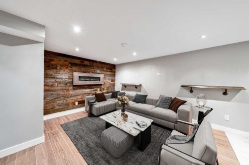 100 Woodfield Green Sw, Calgary, AB - Indoor With Fireplace