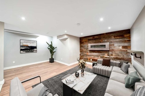 100 Woodfield Green Sw, Calgary, AB - Indoor With Fireplace