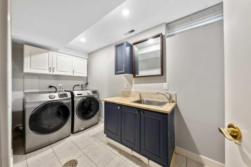 100 Woodfield Green Sw, Calgary, AB - Indoor Photo Showing Laundry Room