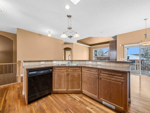157 Valley Creek Place Nw, Calgary, AB - Indoor Photo Showing Kitchen With Double Sink