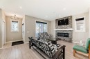 75 Howse Rise Ne, Calgary, AB  - Indoor Photo Showing Living Room With Fireplace 