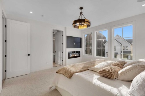 342 Normandy Drive Sw, Calgary, AB - Indoor With Fireplace