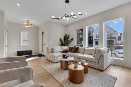 342 Normandy Drive Sw, Calgary, AB - Indoor Photo Showing Living Room
