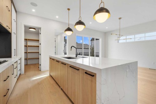 342 Normandy Drive Sw, Calgary, AB - Indoor Photo Showing Kitchen With Upgraded Kitchen