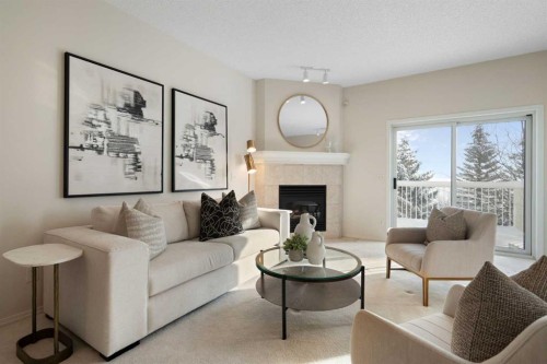 100 Hamptons Link Nw, Calgary, AB - Indoor Photo Showing Living Room With Fireplace