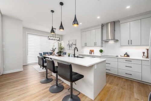122 Ambleside Heath Nw, Calgary, AB - Indoor Photo Showing Kitchen With Upgraded Kitchen