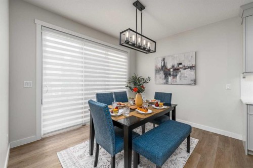 122 Ambleside Heath Nw, Calgary, AB - Indoor Photo Showing Dining Room