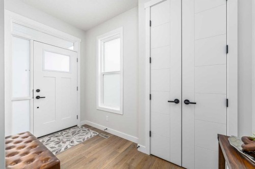 122 Ambleside Heath Nw, Calgary, AB - Indoor Photo Showing Other Room