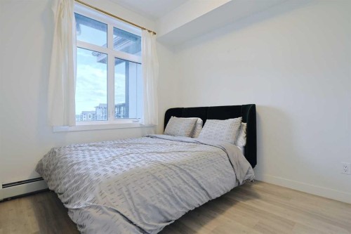 413-20 Sage Hill Walk Nw, Calgary, AB - Indoor Photo Showing Bedroom