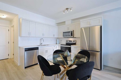 413-20 Sage Hill Walk Nw, Calgary, AB - Indoor Photo Showing Kitchen With Stainless Steel Kitchen