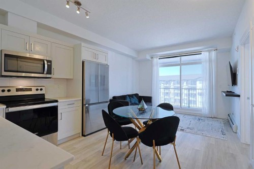 413-20 Sage Hill Walk Nw, Calgary, AB - Indoor Photo Showing Kitchen With Stainless Steel Kitchen
