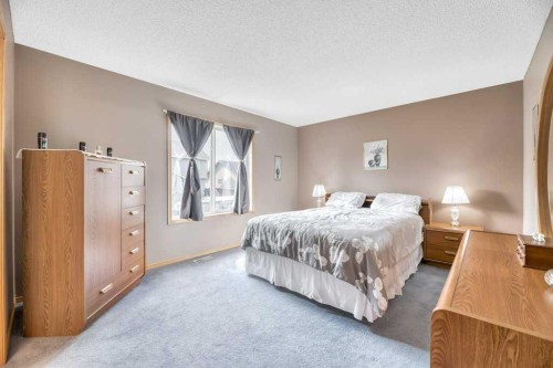 141 West Creek Crescent, Chestermere, AB - Indoor Photo Showing Bedroom