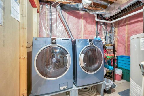 141 West Creek Crescent, Chestermere, AB - Indoor Photo Showing Laundry Room
