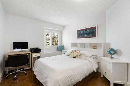 106 Shawnee Place Sw, Calgary, AB - Indoor Photo Showing Bedroom