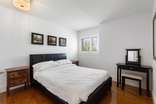 106 Shawnee Place Sw, Calgary, AB - Indoor Photo Showing Bedroom