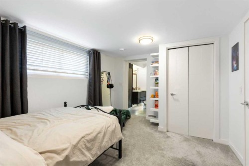 106 Shawnee Place Sw, Calgary, AB - Indoor Photo Showing Bedroom