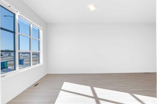 733 South Point Gate Sw, Airdrie, AB - Indoor Photo Showing Other Room