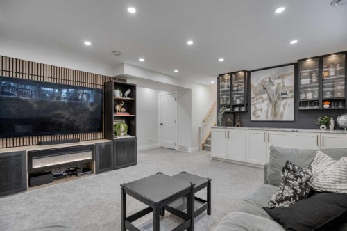 168 Oakside Circle, Calgary, AB - Indoor With Fireplace