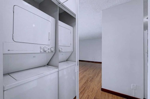 105-659 4 Avenue Ne, Calgary, AB - Indoor Photo Showing Laundry Room