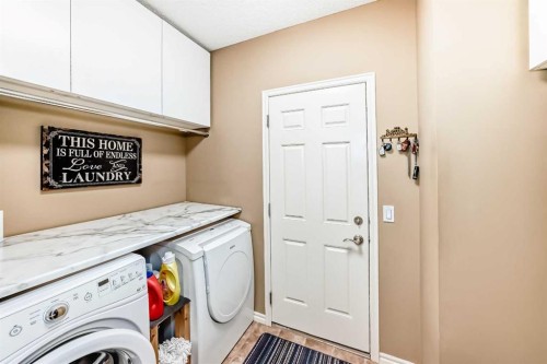 41 Kincora Drive Nw, Calgary, AB - Indoor Photo Showing Laundry Room