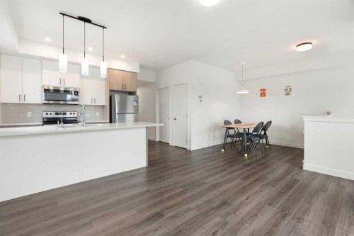 122 Spring Creek Common Sw, Calgary, AB - Indoor Photo Showing Kitchen With Upgraded Kitchen