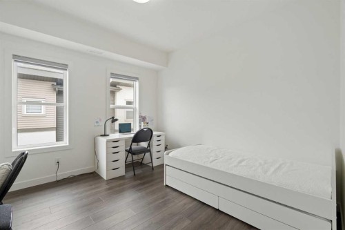 122 Spring Creek Common Sw, Calgary, AB - Indoor Photo Showing Bedroom