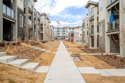 122 Spring Creek Common Sw, Calgary, AB - Outdoor With Balcony With Facade