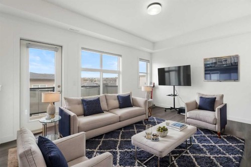 122 Spring Creek Common Sw, Calgary, AB - Indoor Photo Showing Living Room