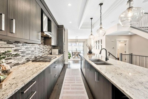 1126 40 Street Sw, Calgary, AB - Indoor Photo Showing Kitchen With Double Sink With Upgraded Kitchen